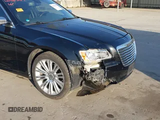 2011 Chrysler 300 with VIN 2C3CA6CT8BH595198, listed as a IAAI auction lot 41983417 with 182,067 mi miles. Bid and sale history available at carsss.com. Image 6.