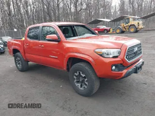 2018 Toyota Tacoma SR with VIN 3TMCZ5AN4JM161623, listed as a IAAI auction lot 41677439 with 75,549 mi miles. Bid and sale history available at carsss.com. Image 1.