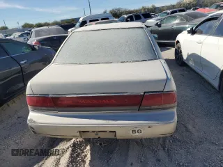 1989 Nissan Maxima z VIN JN1HJ01P6KT276487, wystawiony jako Copart lot #67424274 z przebiegiem Nie podano mil oraz Nie do naprawy. Historia ofert i sprzedaży dostępna na DreamBid. Obrazek 6.