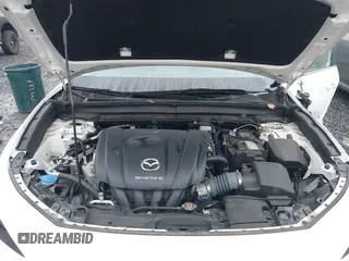 2021 Mazda CX-30 Select with VIN 3MVDMBBL3MM205256, listed as a IAAI auction lot 41302313 with 17,709 mi miles and . Bid and sale history available at DreamBid. Image 10.