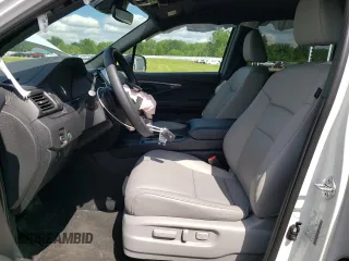 2024 Honda Passport EX-L с VIN 5FNYF8H50RB003995, выставлен на аукционе Copart как лот 60998494 с пробегом 7 193 миль миль и Списание • Salvage title. История ставок и продаж доступна на DreamBid. Изображение 7.