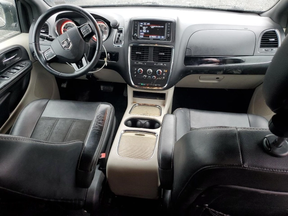 2019 Dodge Grand Caravan SXT with VIN 2C4RDGCG4KR580424, listed as a Copart auction lot 52715245 with 130,696 mi miles and Salvage Title. Bid and sale history available at DreamBid. Image 8.