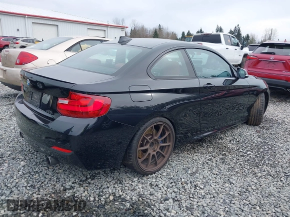 2015 BMW 2 Series M235i with VIN WBA1J7C55FV358527, listed as a IAAI auction lot 41839031 with 81,900 mi miles and . Bid and sale history available at carsss.com. Image 4.
