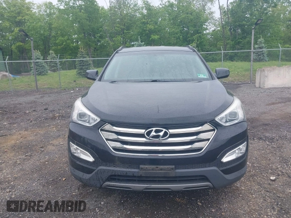 2014 Hyundai Santa Fe z VIN 5XYZUDLB9EG224174, wystawiony jako IAAI lot #42244140 z przebiegiem 84 341 mil mil oraz . Historia ofert i sprzedaży dostępna na DreamBid. Obrazek 6.