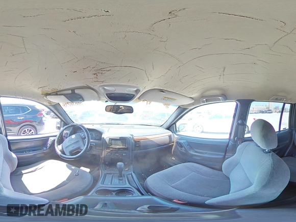 1999 Jeep Grand Cherokee Laredo z VIN 1J4G258SXXC518308, wystawiony jako Copart lot #56636235 z przebiegiem 233 649 mil mil oraz Szkoda całkowita • Salvage title. Historia ofert i sprzedaży dostępna na DreamBid. Obrazek 15.