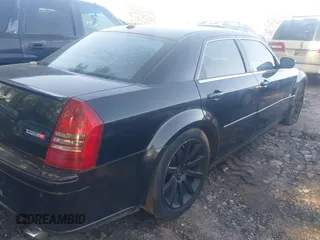 2006 Chrysler 300 C SRT8 with VIN 2C3LA73W66H249303, listed as a IAAI auction lot 42009645 with 137,242 mi miles. Bid and sale history available at carsss.com. Image 4.