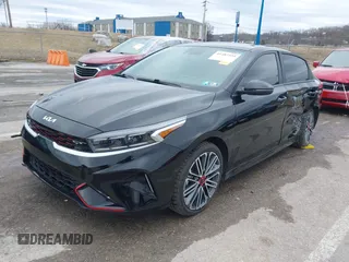2023 Kia Forte GT with VIN 3KPF44AC1PE677400, listed as a IAAI auction lot 41487334 with 15,423 mi miles and . Bid and sale history available at carsss.com. Image 2.