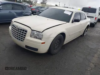 2006 Chrysler 300 with VIN 2C3KA43RX6H470150, listed as a IAAI auction lot 41767272 with 107,457 mi miles. Bid and sale history available at carsss.com. Image 18.