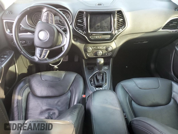 2019 Jeep Cherokee Limited with VIN 1C4PJLDN5KD135764, listed as a Copart auction lot 73637184 with 56,718 mi miles and Salvage Title. Bid and sale history available at DreamBid. Image 8.