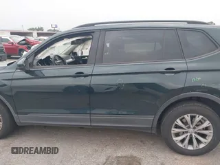 2019 Volkswagen Tiguan S with VIN 3VV1B7AXXKM002312, listed as a IAAI auction lot 42282809 with 80,781 mi miles and . Bid and sale history available at DreamBid. Image 14.