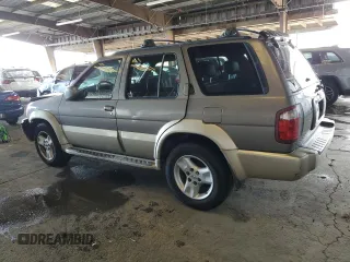 2001 Infiniti QX4 with VIN JNRDR09X21W204448, listed as a Copart auction lot 82619574 with 114,520 mi miles and Salvage Title. Bid and sale history available at DreamBid. Image 2.