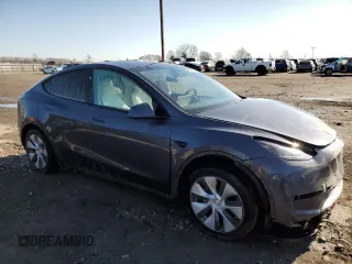 2023 Tesla Model Y Long Range z VIN 7SAYGDEE0PA206005, wystawiony jako Copart lot #50681145 z przebiegiem 31 989 mil mil oraz Szkoda całkowita • Salvage title. Historia ofert i sprzedaży dostępna na DreamBid. Obrazek 4.