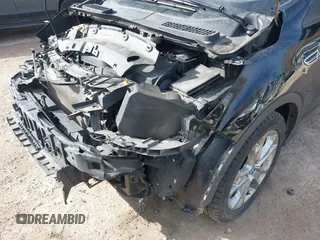 2016 Ford Escape Titanium with VIN 1FMCU9JX4GUB38303, listed as a IAAI auction lot 41788421 with 138,511 mi miles and . Bid and sale history available at DreamBid. Image 21.
