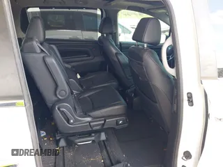 2021 Honda Odyssey Touring z VIN 5FNRL6H80MB003323, wystawiony jako IAAI lot #42303968 z przebiegiem 51 531 mil mil oraz . Historia ofert i sprzedaży dostępna na DreamBid. Obrazek 8.