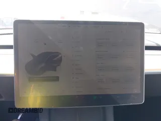 2022 Tesla Model Y Long Range z VIN 7SAYGAEE9NF574634, wystawiony jako IAAI lot #42040719 z przebiegiem 29 675 mil mil oraz . Historia ofert i sprzedaży dostępna na DreamBid. Obrazek 7.