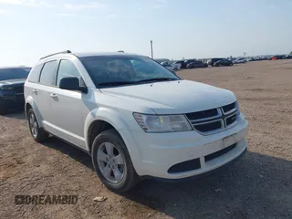 2017 Dodge Journey SE z VIN 3C4PDCAB0HT521724, wystawiony jako IAAI lot #42278964 z przebiegiem 169 203 mil mil oraz . Historia ofert i sprzedaży dostępna na DreamBid. Obrazek 1.