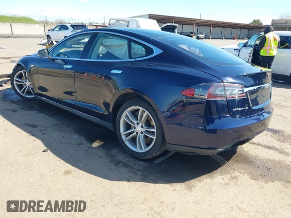 2014 Tesla Model S 60 with VIN 5YJSA1H11EFP47897, listed as a IAAI auction lot 41802285 with Not Provided miles and . Bid and sale history available at DreamBid. Image 3.