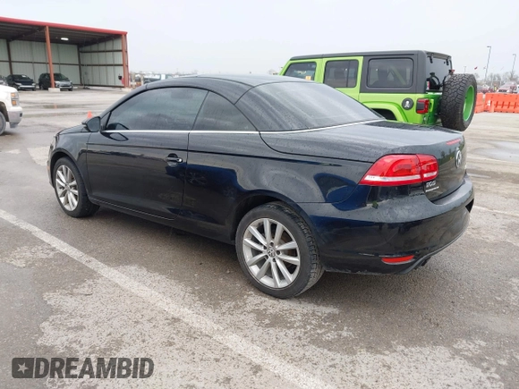 2014 Volkswagen Eos Komfort with VIN WVWBW8AH4EV007229, listed as a IAAI auction lot 41894160 with 66,984 mi miles and . Bid and sale history available at DreamBid. Image 3.