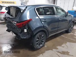 2019 Kia Sportage EX z VIN KNDPNCAC0K7575087, wystawiony jako IAAI lot #41202355 z przebiegiem 31 768 mil mil oraz . Historia ofert i sprzedaży dostępna na DreamBid. Obrazek 4.