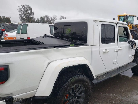 2021 Jeep Gladiator Overland with VIN 1C6HJTFG8ML567025, listed as a IAAI auction lot 41582271 with 53,621 mi miles. Bid and sale history available at carsss.com. Image 6.