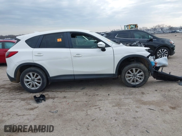 2016 Mazda CX-5 Touring with VIN JM3KE2CY1G0888850, listed as a IAAI auction lot 41562701 with 1 mi miles. Bid and sale history available at carsss.com. Image 13.