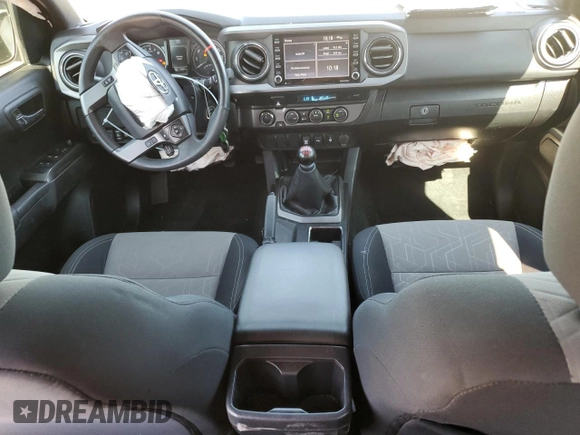 2022 Toyota Tacoma SR z VIN 3TYCZ5AN8NT076536, wystawiony jako Copart lot #55268985 z przebiegiem 57 697 mil mil oraz Szkoda całkowita • Salvage title. Historia ofert i sprzedaży dostępna na DreamBid. Obrazek 8.