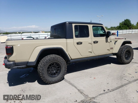 2020 Jeep Gladiator Rubicon z VIN 1C6JJTBG2LL190732, wystawiony jako Copart lot #57100115 z przebiegiem 55 679 mil mil oraz Szkoda całkowita • Salvage title. Historia ofert i sprzedaży dostępna na DreamBid. Obrazek 3.