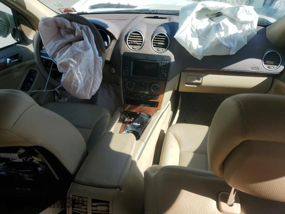 2009 Mercedes-Benz GL 450 with VIN 4JGBF71E59A519316, listed as a Copart auction lot 75270484 with 218,118 mi miles and Salvage Title. Bid and sale history available at DreamBid. Image 8.