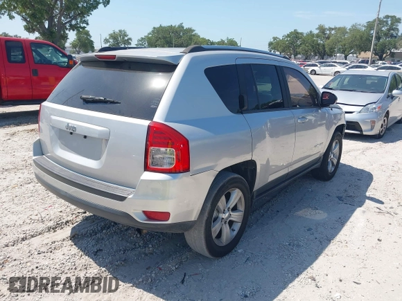 2012 Jeep Compass Sport with VIN 1C4NJCBA7CD660091, listed as a IAAI auction lot 42113038 with 123,181 mi miles. Bid and sale history available at carsss.com. Image 4.