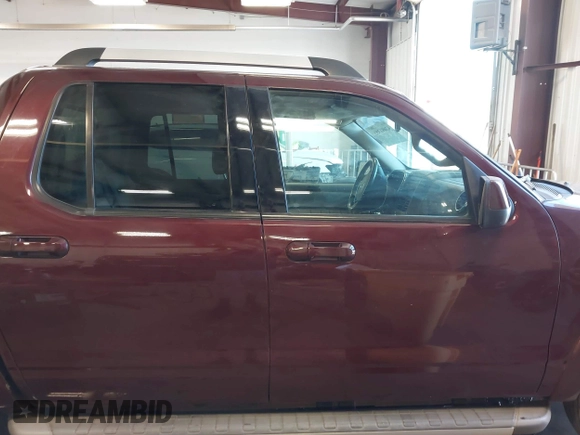 2007 Ford Explorer Sport Trac Limited z VIN 1FMEU53807UA22975, wystawiony jako IAAI lot #42691255 z przebiegiem 106 066 mil mil oraz . Historia ofert i sprzedaży dostępna na DreamBid. Obrazek 13.