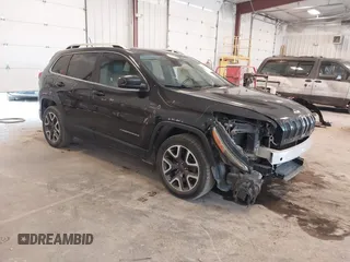 2014 Jeep Cherokee Limited with VIN 1C4PJMDS9EW180467, listed as a IAAI auction lot 42597933 with 201,570 mi miles and . Bid and sale history available at DreamBid. Image 1.