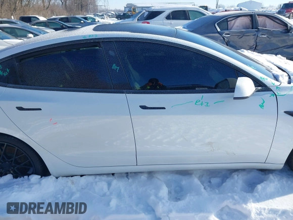 2021 Tesla Model 3 Performance with VIN 5YJ3E1EC1MF063445, listed as a IAAI auction lot 41293243 with 43,143 mi miles and . Bid and sale history available at DreamBid. Image 13.