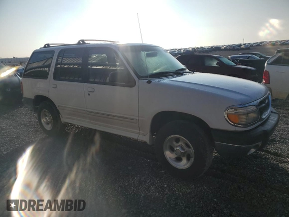 1999 Ford Explorer XL z VIN 1FMZU34XXXUB80803, wystawiony jako Copart lot #87027834 z przebiegiem 222 864 mil mil oraz Szkoda całkowita • Salvage title. Historia ofert i sprzedaży dostępna na DreamBid. Obrazek 4.