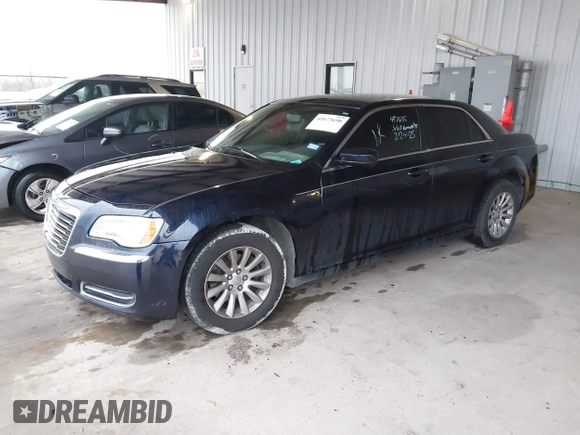 2011 Chrysler 300 with VIN 2C3CA4CGXBH523474, listed as a IAAI auction lot 41673690 with 187,389 mi miles. Bid and sale history available at carsss.com. Image 2.