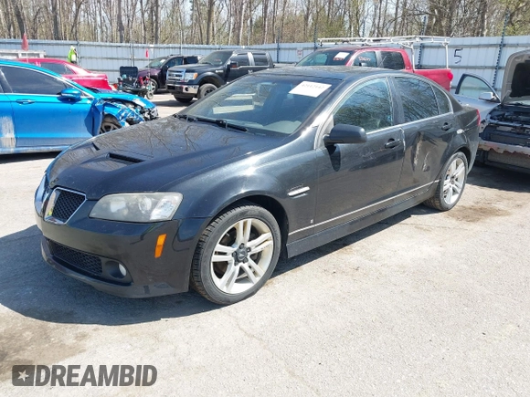 2009 Pontiac G8 with VIN 6G2ER57769L185606, listed as a IAAI auction lot 42112142 with 187,365 mi miles. Bid and sale history available at carsss.com. Image 2.