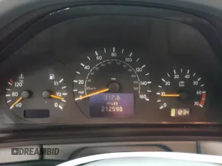 2000 Mercedes-Benz E-Class with VIN WDBJF82J1YX030388, listed as a Copart auction lot 86384974 with 212,596 mi miles and Salvage Title. Bid and sale history available at carsss.com. Image 9.
