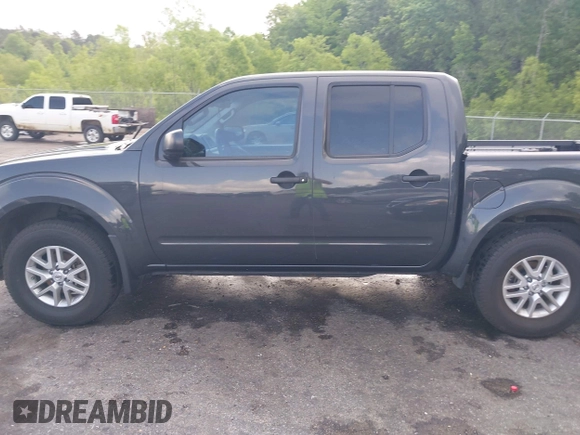 2015 Nissan Frontier SV with VIN 1N6AD0EV6FN751948, listed as a IAAI auction lot 42063935 with 52,244 mi miles and . Bid and sale history available at DreamBid. Image 14.