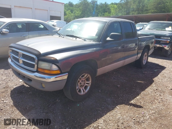 2001 Dodge Dakota Sport z VIN 1B7HL2ANX1S297770, wystawiony jako IAAI lot #42309715 z przebiegiem 279 458 mil mil oraz . Historia ofert i sprzedaży dostępna na DreamBid. Obrazek 2.