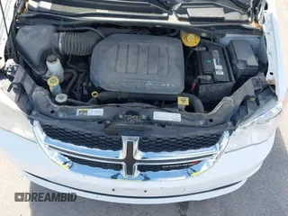 2014 Dodge Grand Caravan American Value with VIN 2C4RDGBG8ER140342, listed as a IAAI auction lot 42198306 with 135,564 mi miles and . Bid and sale history available at DreamBid. Image 10.