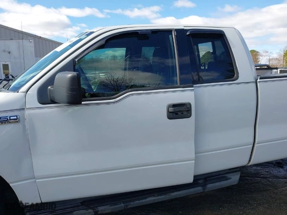2004 Ford F-150 XL with VIN 1FTPX12534KD88635, listed as a IAAI auction lot 41736508 with 127,366 mi miles. Bid and sale history available at carsss.com. Image 14.