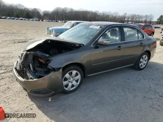 2010 Kia Optima LX with VIN KNAGG4A8XA5379242, listed as a Copart auction lot 48992365 with 291,492 mi miles and Clean Title. Bid and sale history available at carsss.com. Image 1.