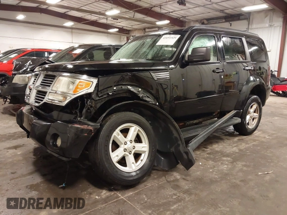 2007 Dodge Nitro SXT with VIN 1D8GU28K67W663621, listed as a IAAI auction lot 41691529 with 211,556 mi miles. Bid and sale history available at carsss.com. Image 2.