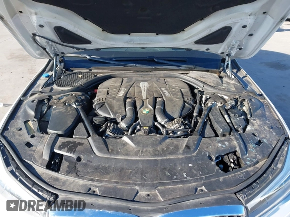 2018 BMW 7 Series 750i with VIN WBA7F0C57JGM23667, listed as a IAAI auction lot 41581035 with 113,140 mi miles and . Bid and sale history available at DreamBid. Image 10.