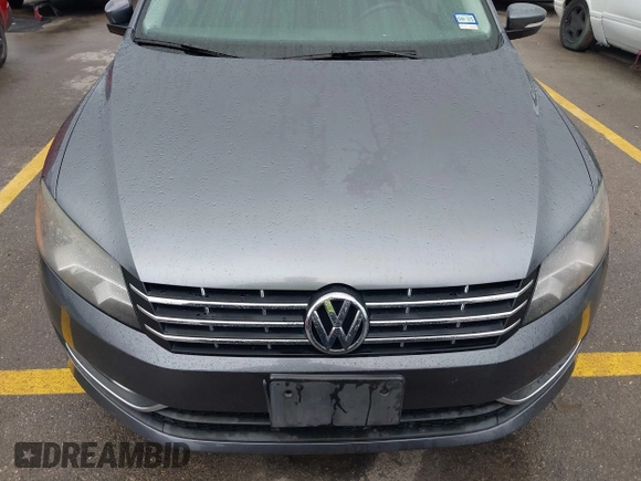 2013 Volkswagen Passat SE with VIN 1VWBN7A34DC148052, listed as a IAAI auction lot 42423919 with 83,634 mi miles and . Bid and sale history available at DreamBid. Image 6.