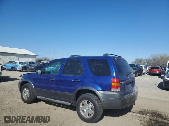 2006 Ford Escape XLT with VIN 1FMYU93136KA51162, listed as a Copart auction lot 52239385 with 227,666 mi miles and Salvage title. Bid and sale history available at DreamBid. Image 2.