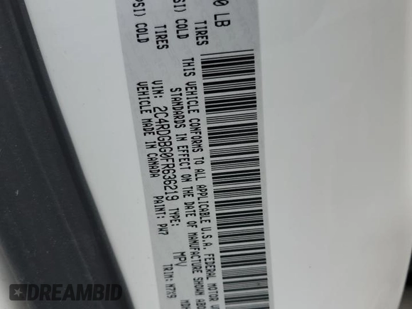 2015 Dodge Grand Caravan American Value with VIN 2C4RDGBG0FR636219, listed as a Copart auction lot 54527235 with 95,175 mi miles and Salvage Title. Bid and sale history available at DreamBid. Image 14.
