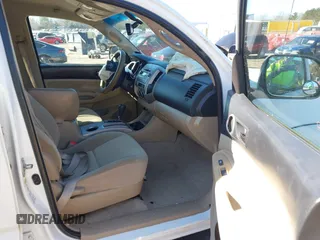 2009 Toyota Tacoma PreRunner with VIN 3TMJU62N79M078810, listed as a IAAI auction lot 41358051 with 154,001 mi miles. Bid and sale history available at carsss.com. Image 5.