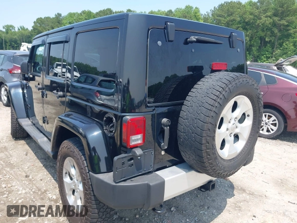 2014 Jeep Wrangler Unlimited Sahara with VIN 1C4BJWEG0EL273086, listed as a IAAI auction lot 42340938 with 121,448 mi miles and . Bid and sale history available at DreamBid. Image 3.
