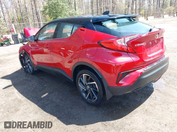 2021 Toyota C-HR LE with VIN NMTKHMBX9MR134669, listed as a IAAI auction lot 41982475 with 11,572 mi miles. Bid and sale history available at carsss.com. Image 3.