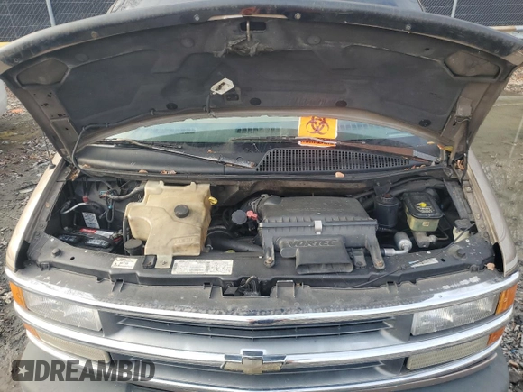 1996 Chevrolet Chevy Van z VIN 1GBFG15M1T1001653, wystawiony jako Copart lot #84589274 z przebiegiem Nie podano mil oraz Nie do naprawy • Non repairable. Historia ofert i sprzedaży dostępna na DreamBid. Obrazek 13.